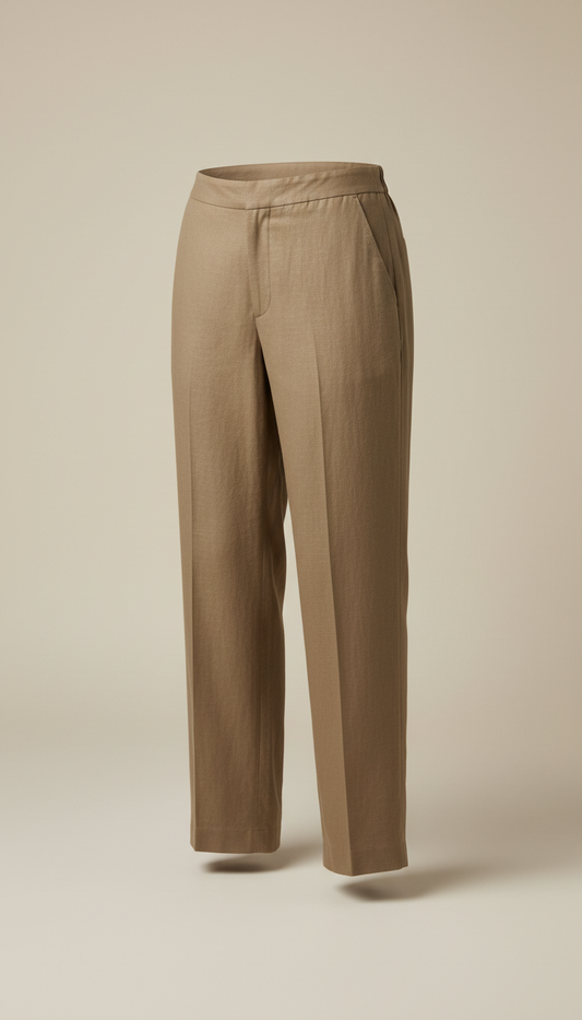 A pair of versatile linen trousers from the 'Disciplined Elegance' collection, reflecting the minimalist design and...